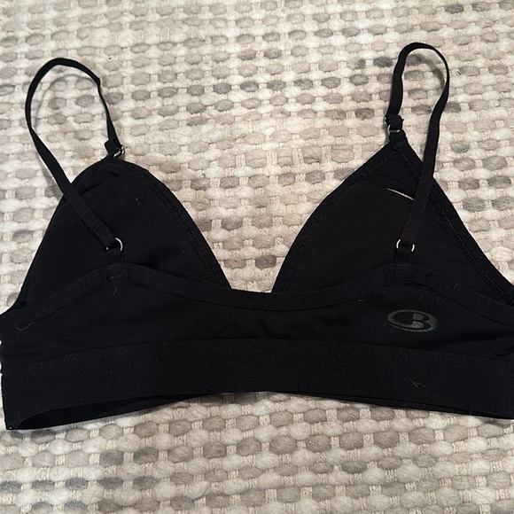 Two athletic bras. One by ice breaker and the other Boody. - Picture 3 of 3